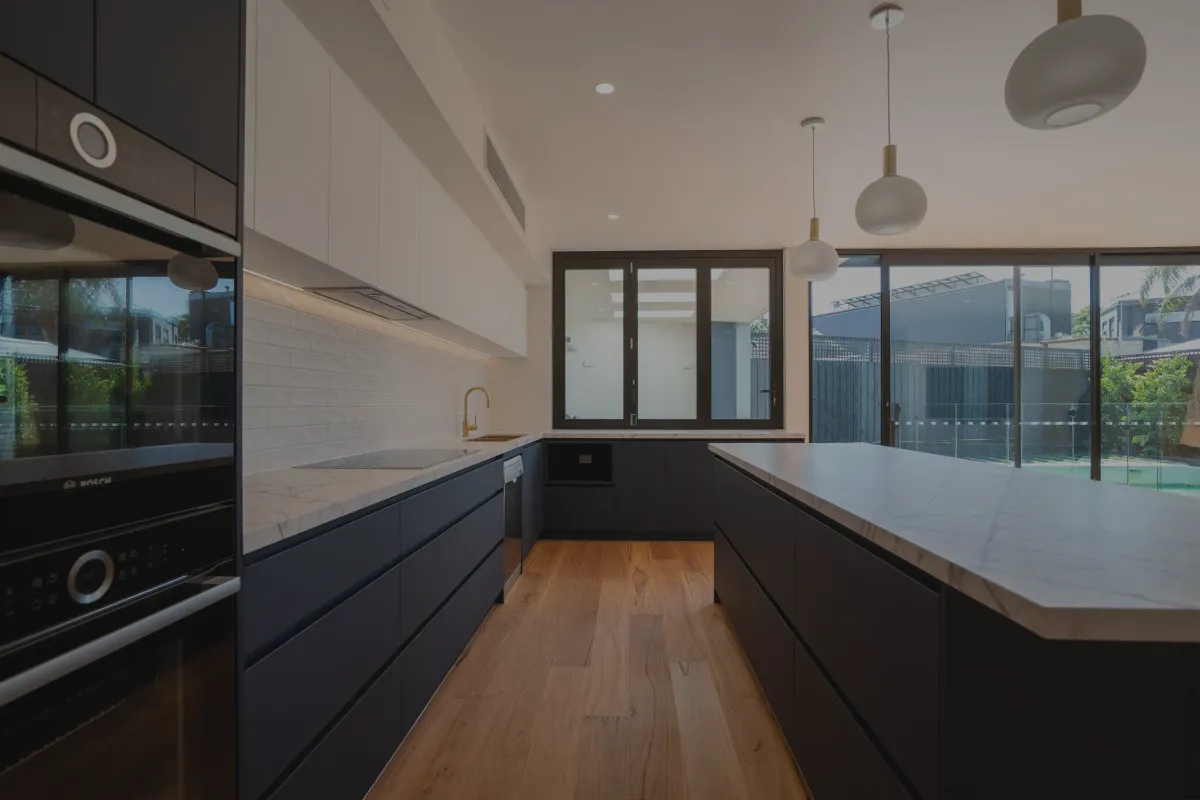 Luxury kitchen with pool view — Hampton, completed by Nicon Built