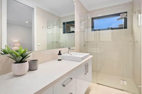 Spotless white bathroom after renovation clean — Nicon Built