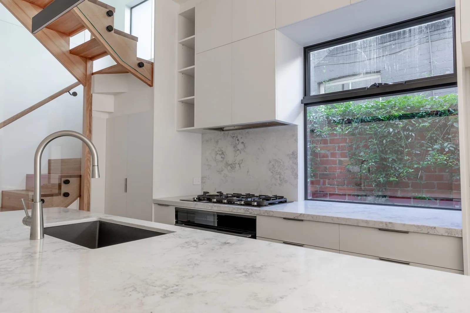 Heritage staircase and modern kitchen renovation by Nicon Built