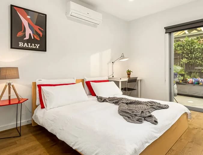 Renovated bedroom with built-in study nook by Nicon Built