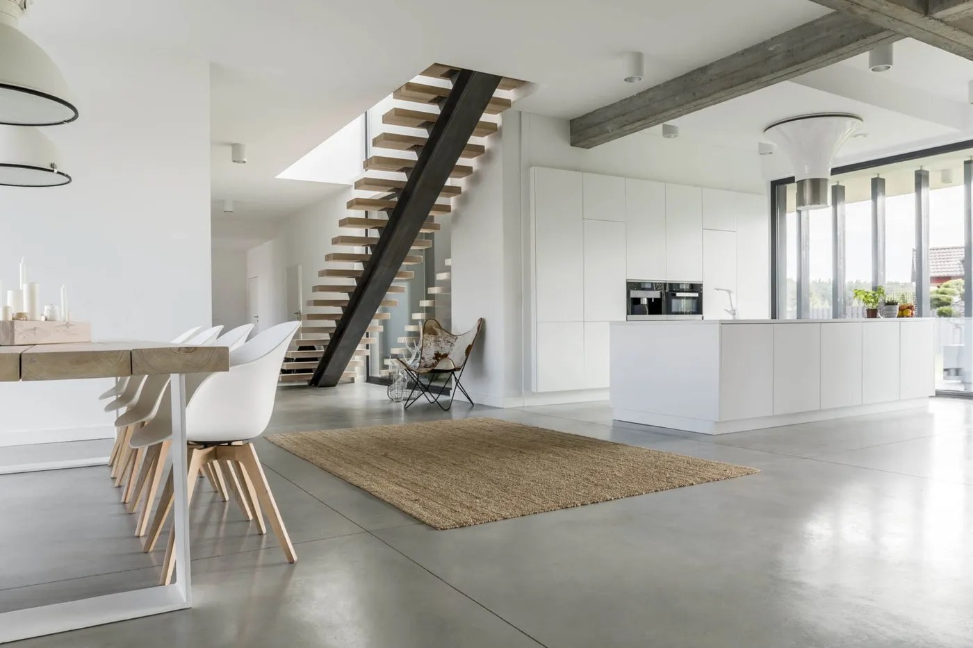 Polished concrete floor in open-plan living — Nicon Built