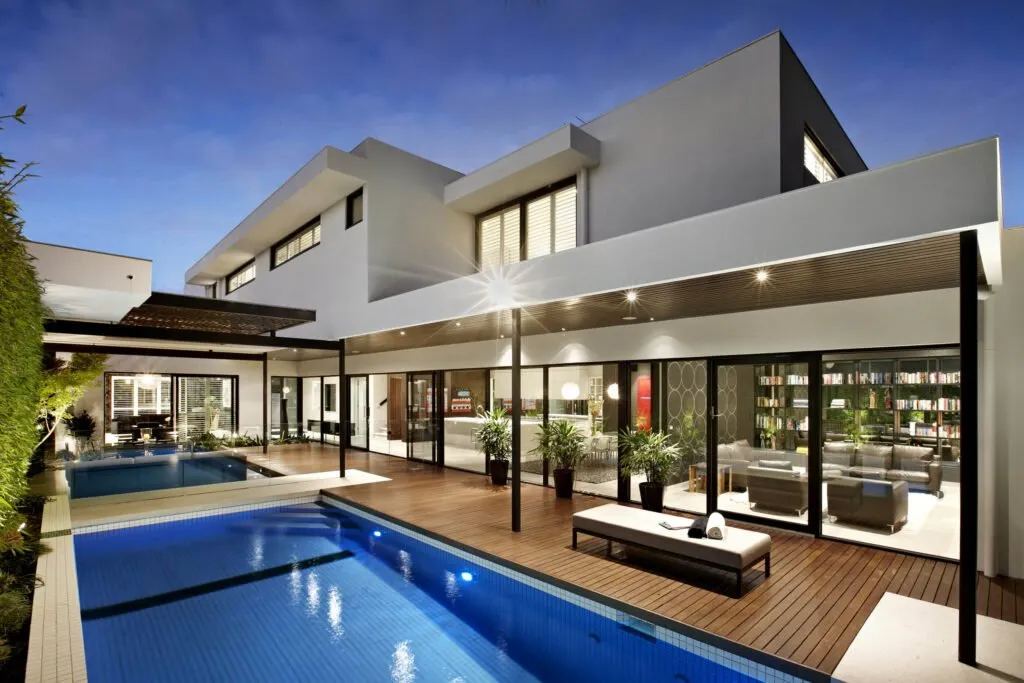 Pool area with paved and decked outdoor entertaining — Nicon Built