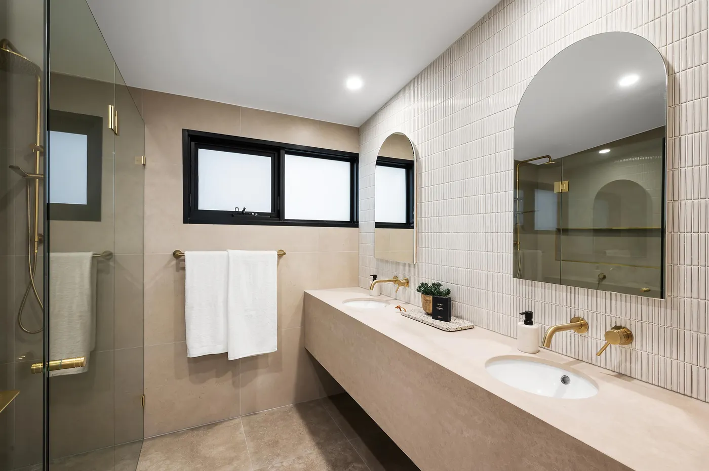 Tiled bathroom with double vanity — Nicon Built