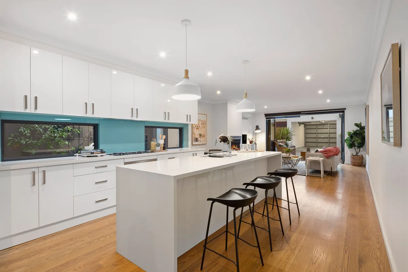 Feature splashback tiling in kitchen renovation — Nicon Built